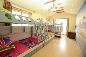 Image of a Kids bed room with double coated beds